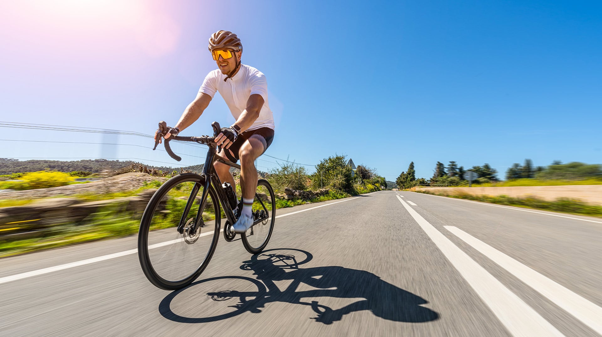 Weather in Mallorca, cyclist riding in the month of October