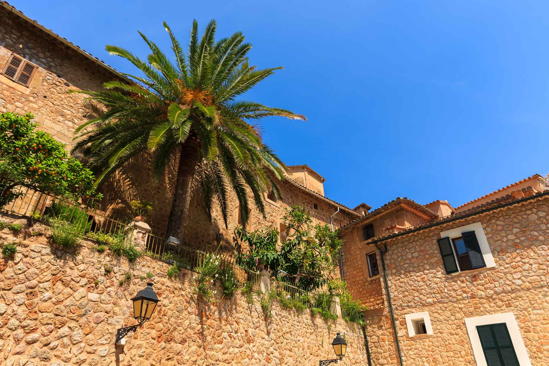 The charming village of Fornalutx is located in the valley of Sóller (Mallorca) and is framed by the majestic Tramuntana mountain range.